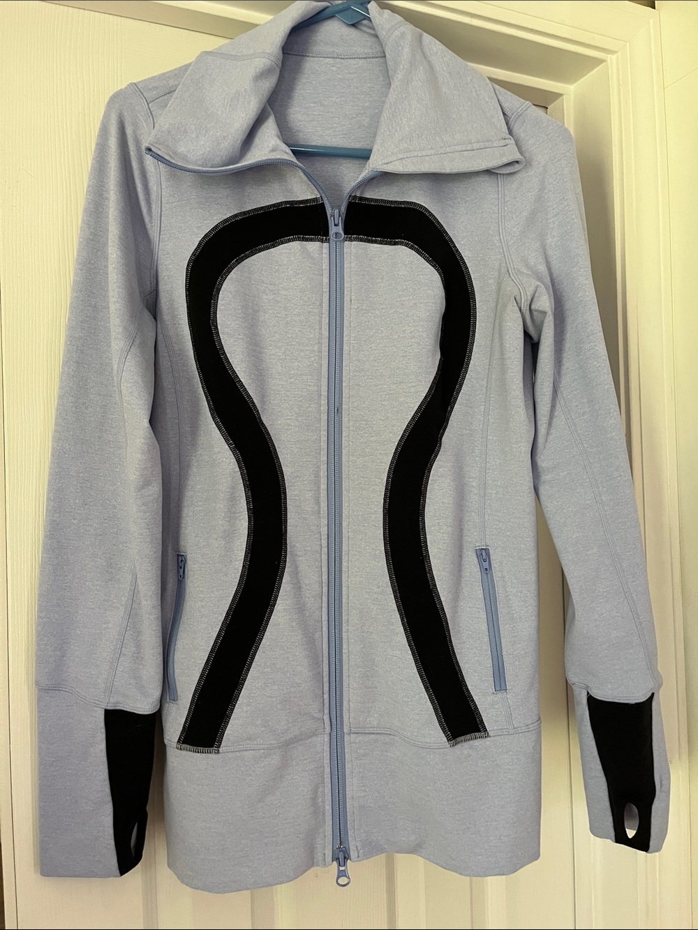 Lululemon blue athletic jacket with black logo